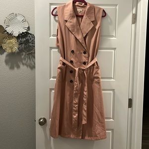 Pink long vest over coat. Tea & Cup